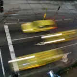 Vehicles On City Street At Night