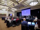 CMEV Conference Room With People Watching A Speaker