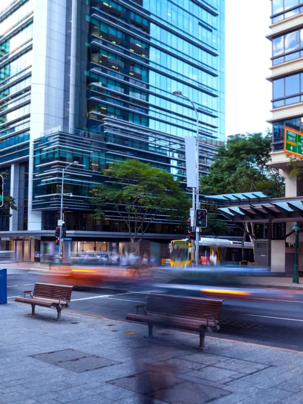 Inner City Street Scape With Cars And People